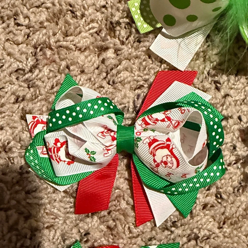 Girls 5 Christmas bows top bow is a custom Micky and Minnie Christmas bow